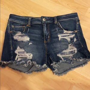 Distressed super stretch denim shorts